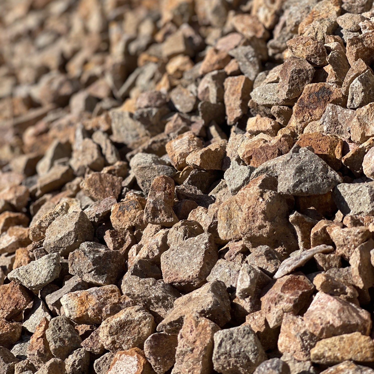 Decorative Rock, Artificial Turf, or Bulk Soil: Choosing the Right Desert Landscape Base